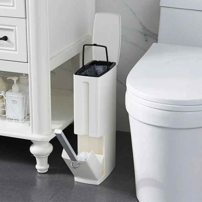 Sleek white bathroom organizer with integrated trash bin next to a modern toilet for functional and stylish storage.