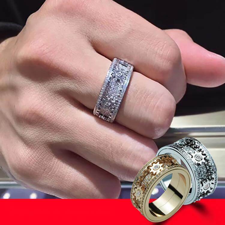 Stylish silver fidget ring for anxiety and focus worn on hand with two additional ring designs shown on a red background.