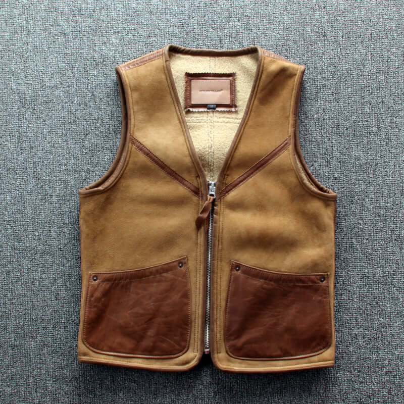 Lamb wool warm leather vest with vintage style, slim-fit design, zipper closure, multiple pockets, and straight hem on grey background.