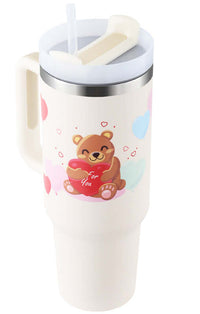 40oz insulated tumbler with handle and straw featuring a cute bear design holding a red heart. Durable stainless steel construction.