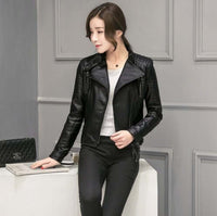 Woman wearing Slim Jacket Motorcycle Leather Women Short in black, stylish short imitation leather jacket with stand-up collar, perfect for any occasion