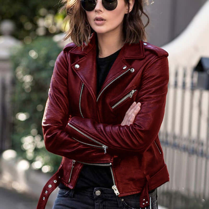 Woman wearing a trendy street style red zip imitation leather jacket with lapel collar, perfect for edgy fashion.