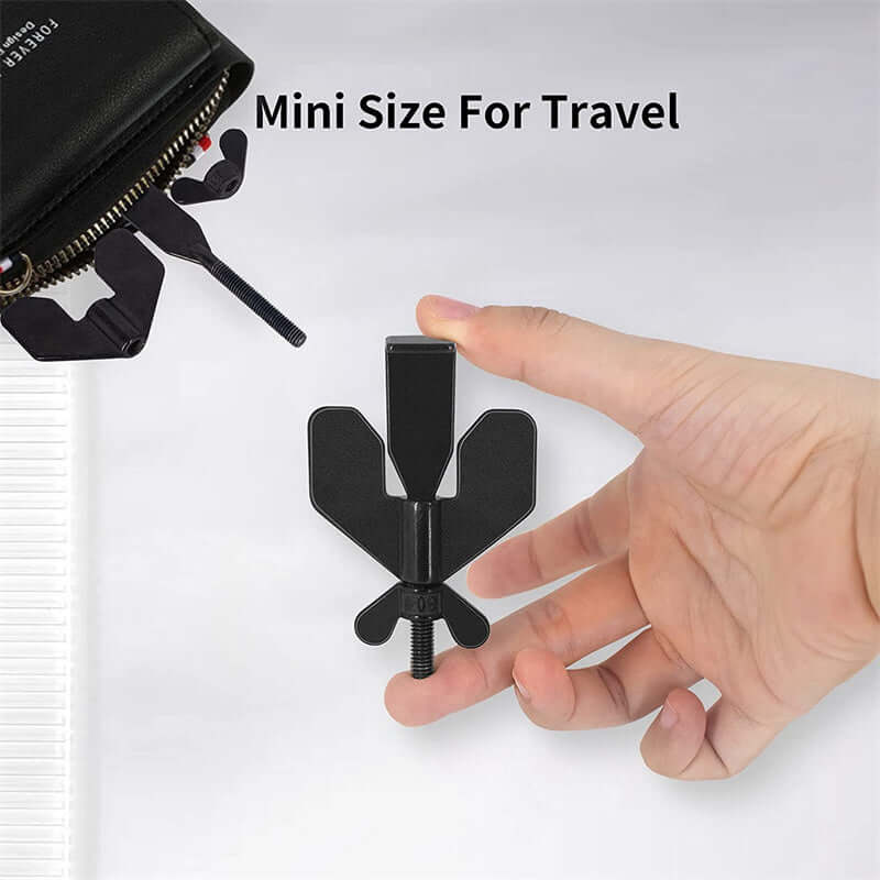 Compact Portable Hotel Door Lock in Hand for Travel Safety and Self-Defense