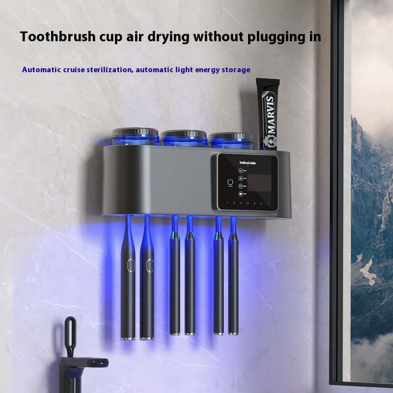 Intelligent drying toothbrush sterilizer storage UV mounted on bathroom wall with toothbrushes and toothpaste, featuring automatic cruise sterilization