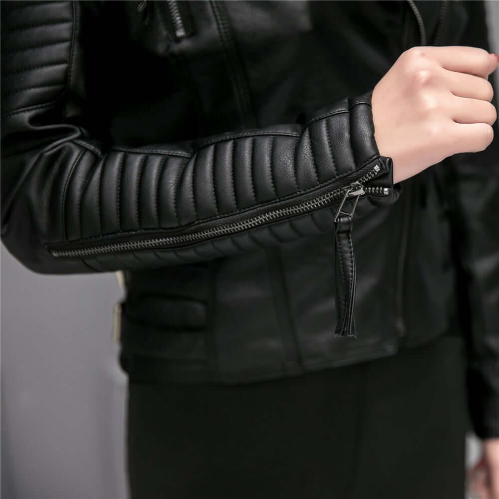 Women's black slim motorcycle leather jacket with stand-up collar and zippered sleeve detail