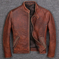 Retro brown real cow leather jacket with stand-up collar and zipper placket, featuring side seam pockets on a textured background.