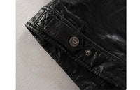 Close-up of Men's Slim-fit Motorcycle Goatskin Leather Jacket Cowhide with zipper decoration in genuine black cowhide material.