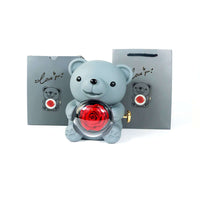 Everlasting Love: Eternal Rose Bear with Rotating Jewelry Box