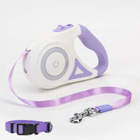 Retractable dog leash and purple dog collar for small to medium pets, featuring a one-handed braking system and a comfortable grip handle.