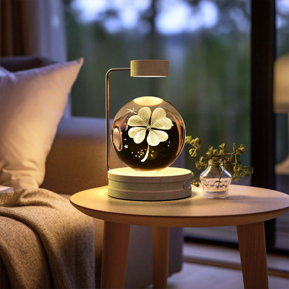 Crystal Ball Cosmic Dinosaur Indoor Night Light on bedside table, providing warm and romantic lighting in a cozy bedroom setting.