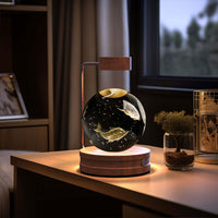 Crystal Ball Cosmic Dinosaur indoor night light with USB power, warm bedside light for birthday gifts, on a wooden base by the window