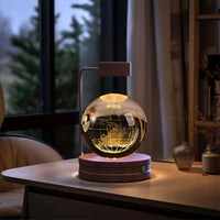 Crystal Ball Cosmic Dinosaur Indoor Night Light USB Powered Warm Bedside Lamp on Table