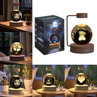 Crystal Ball Cosmic Dinosaur Indoor Night Light with USB Power on wooden base, showcasing various enchanting designs as a warm bedside lamp, perfect birthday gift